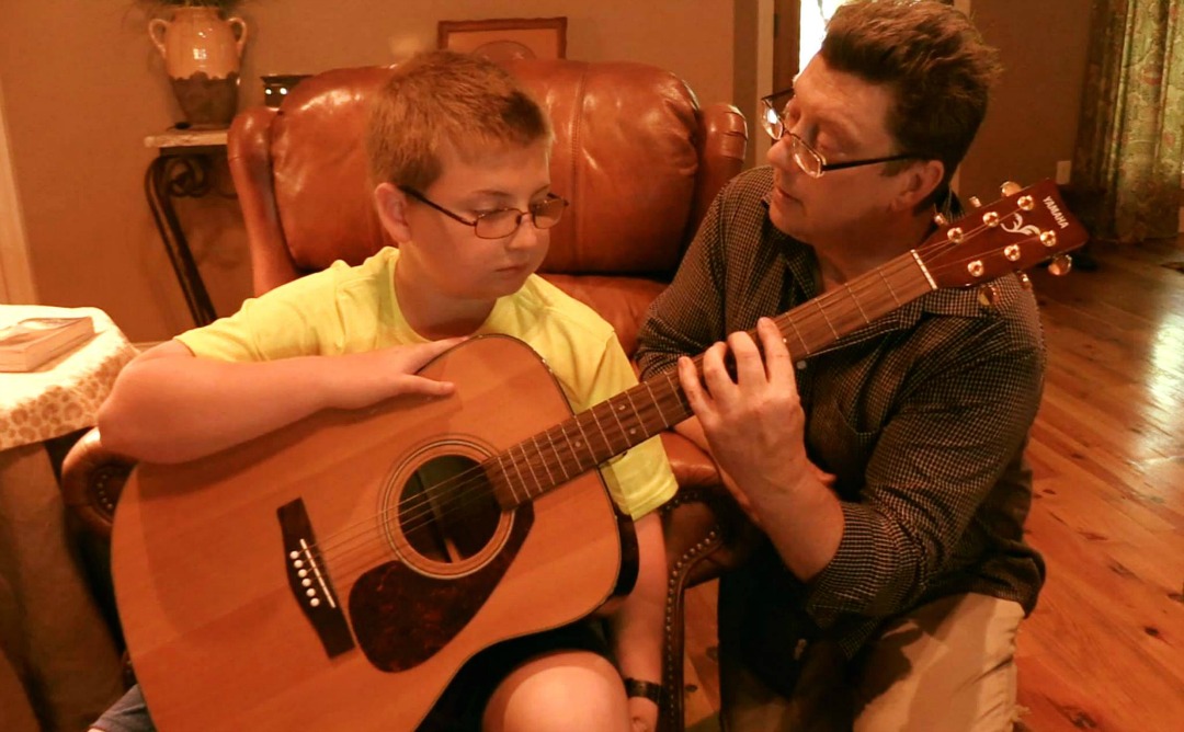 Reed Taking Guitar Lessons with Michael Stephens